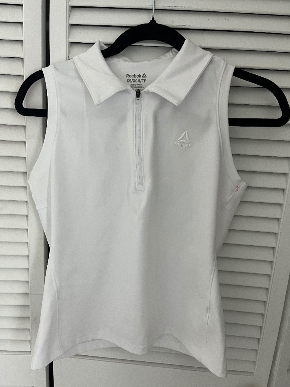Reebok Women’s Baseline Sleeveless Polo , size XS , New with tags !